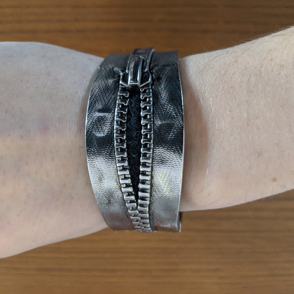 Silver zipper wrist cuff